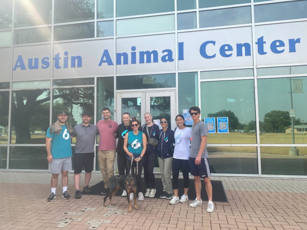 6sense employees standing in front of an animal center