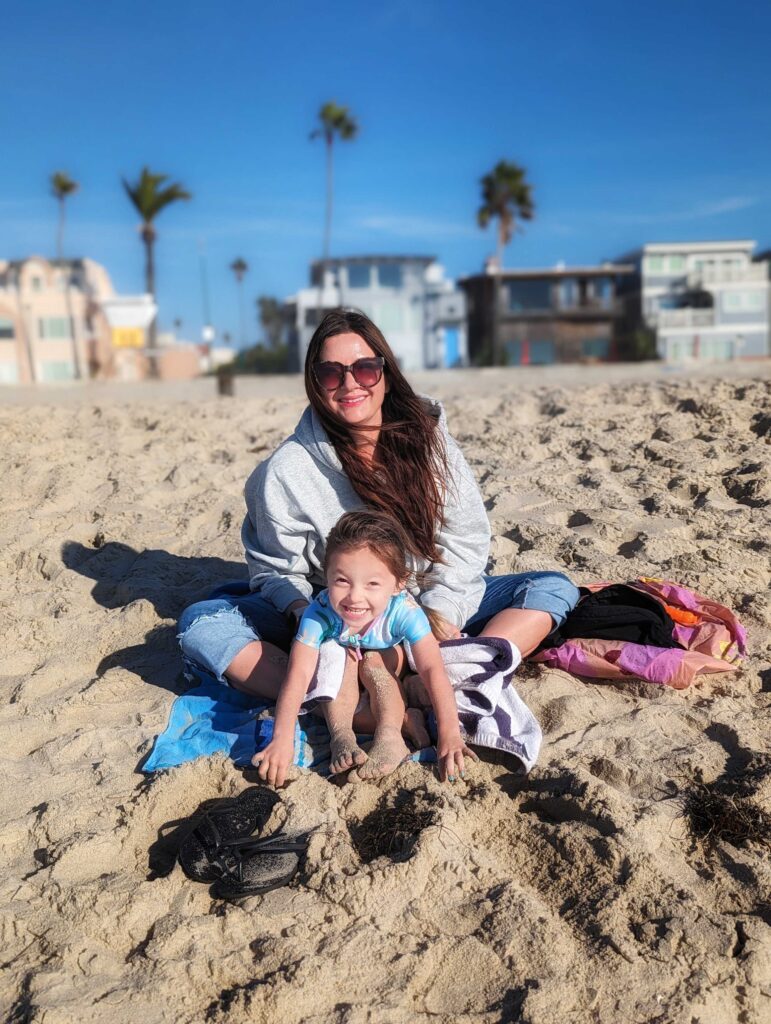 Rachel and her child on the beach