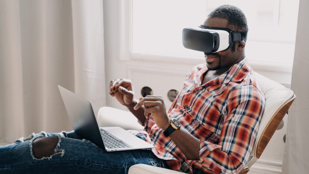A man uses a VR device